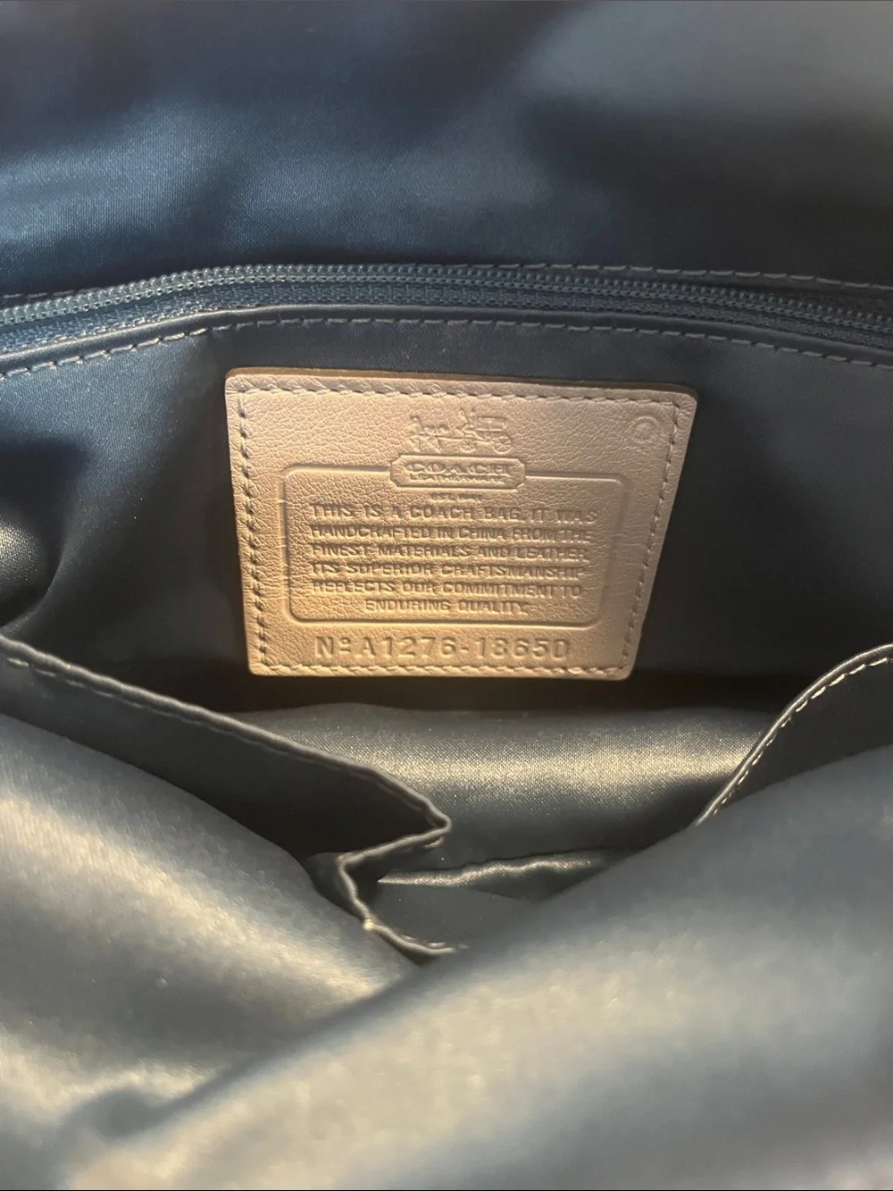 Coach satchel signature